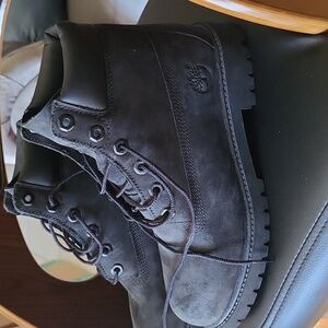 Gently used black suede Timberland boots